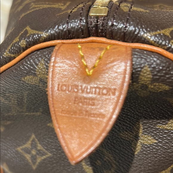 Louis Vuitton Brown Duffel Bag with Iconic Monogram and Leather Trim - Picture 10 of 16